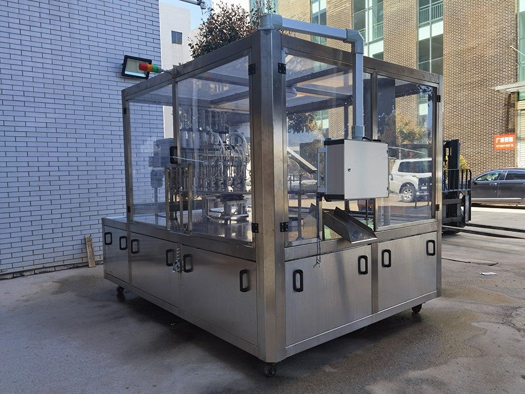 1764832918711738.jpg LG-620 斜嘴袋灌裝旋蓋機(jī)(小).jpg